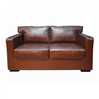 Кожаный диван – грациозный король в мире интерьеров